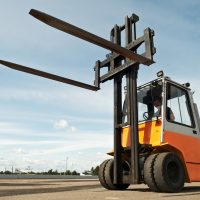 Forklift,Loader,For,Warehouse,Works,Outdoors,With,Risen,Forks